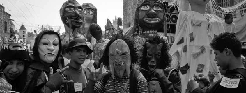 Costumed revelers on los Locos day in San MIguel de allende